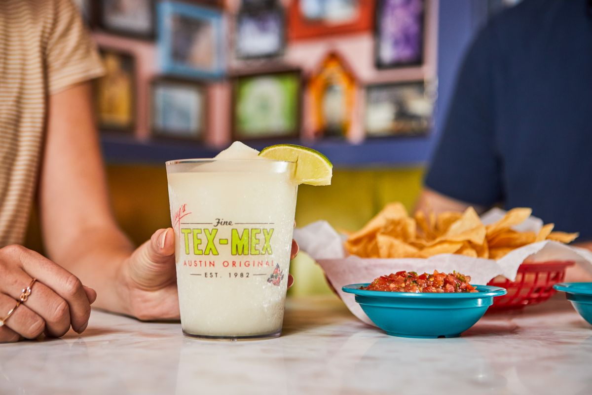 Frozen Marg and Chips served next to some sauce, only at Chuy's.