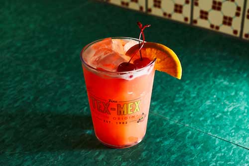 Chuy's Kings Punch served in a glass.