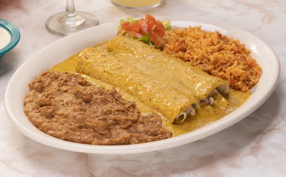 Chuy's Chicka-Chicka Boom-Boom Enchiladas served on a plate.