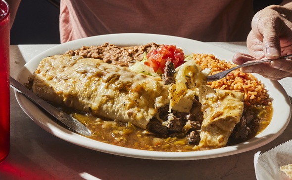 Chuy's Steak Burrito served on a delicious plate.